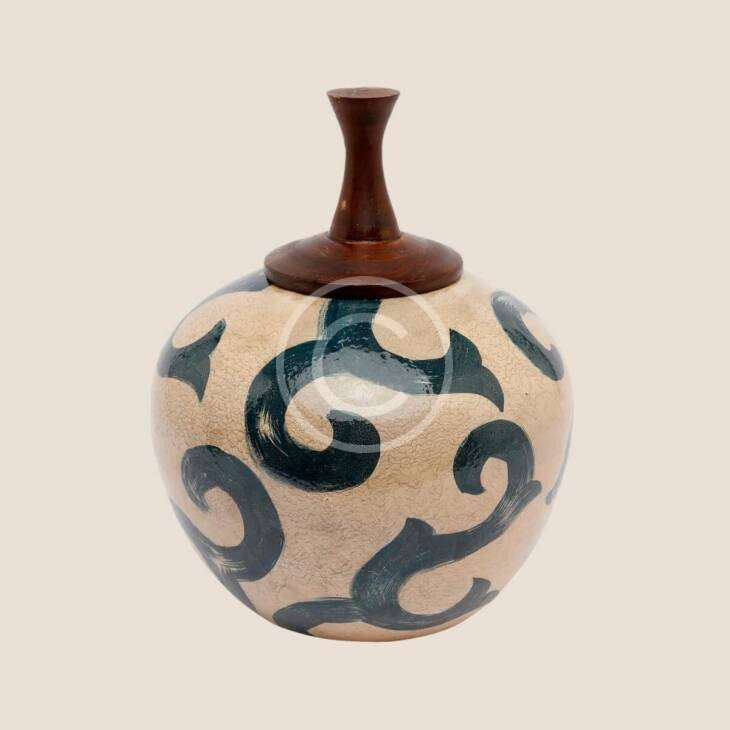 Vase with swirl motifs